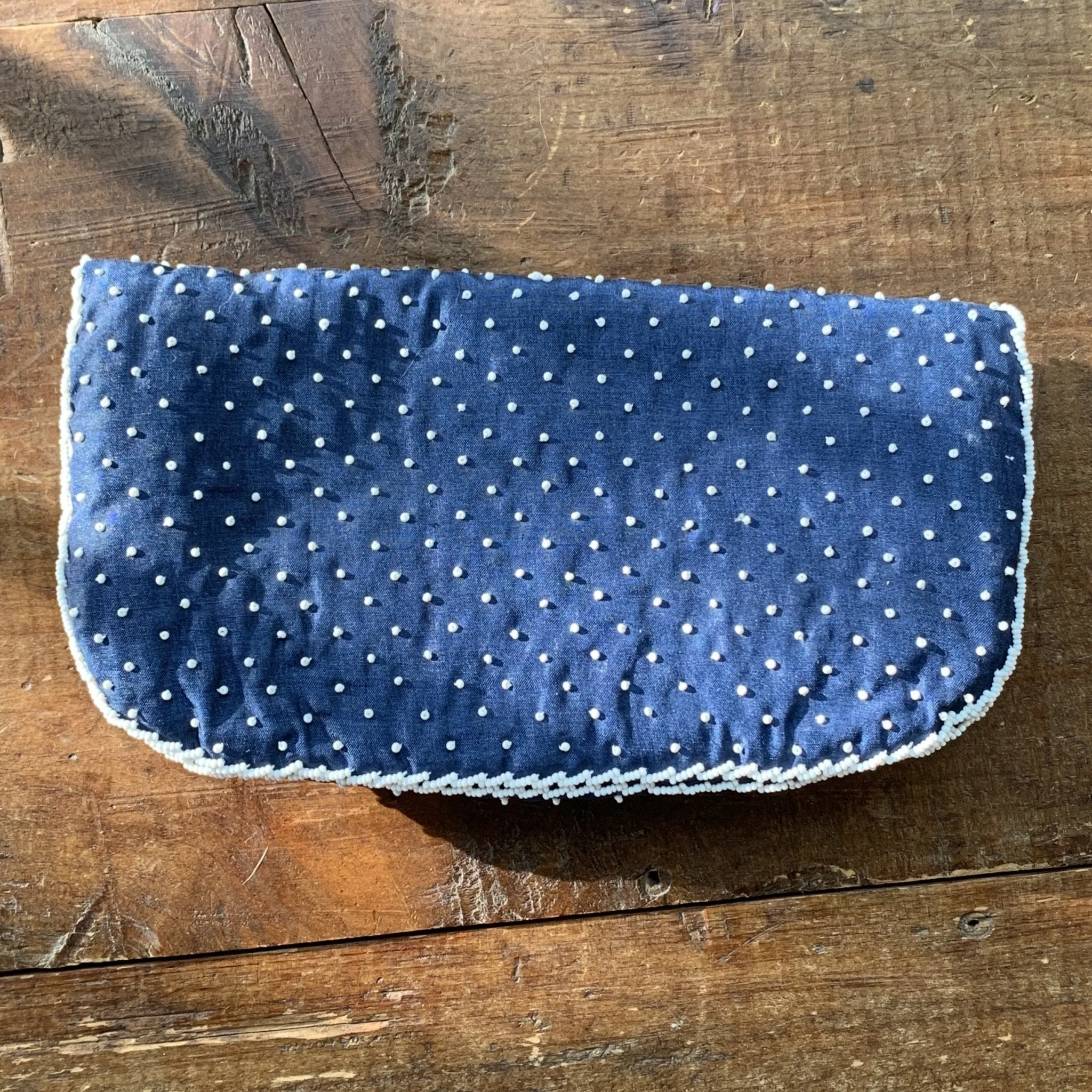 Vintage Navy Blue Clutch with White Beading in a Floral Pattern by Saks Fifth Avenue.