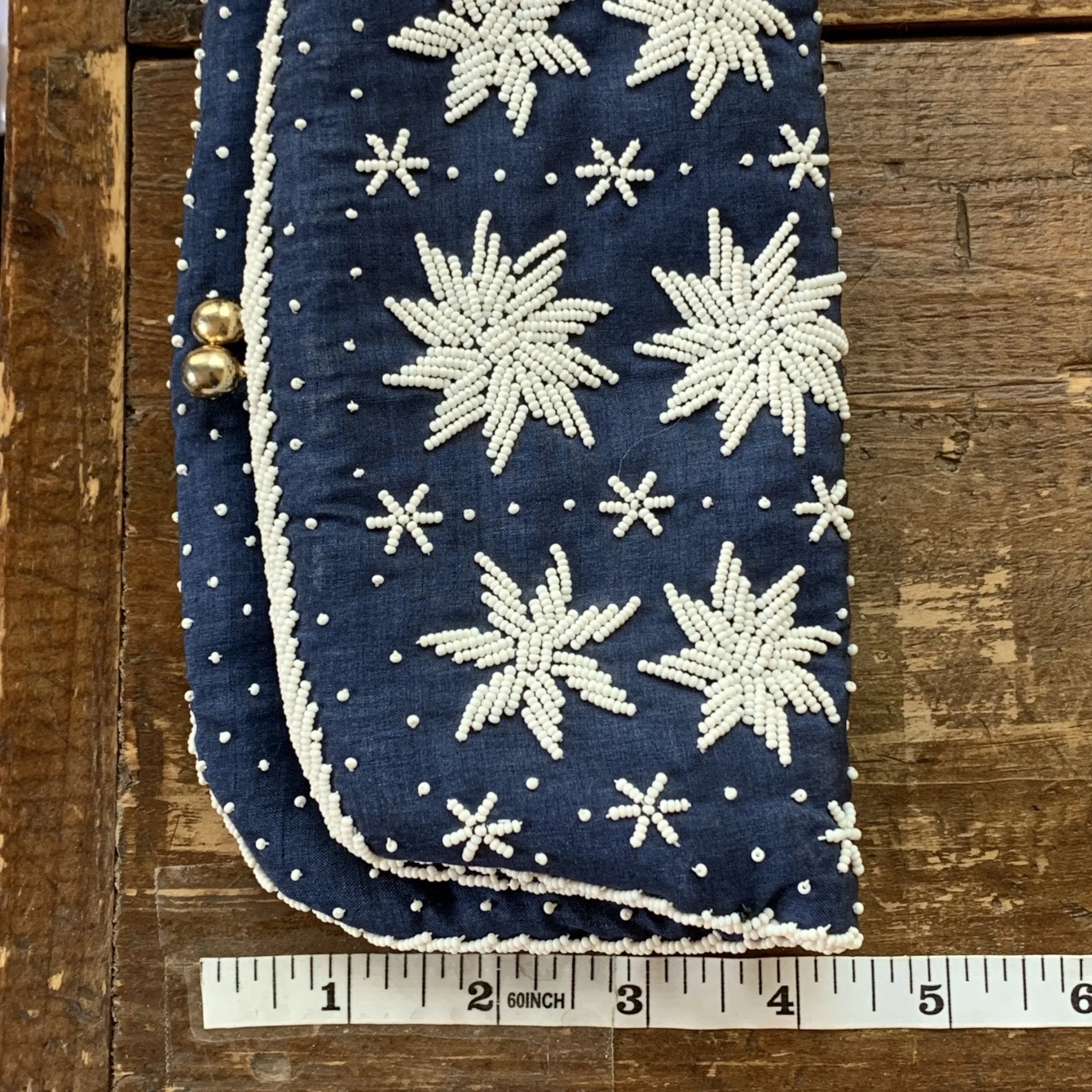 Vintage Navy Blue Clutch with White Beading in a Floral Pattern by Saks Fifth Avenue.